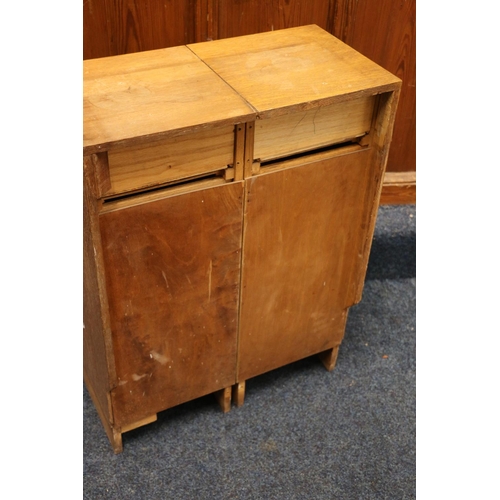 517 - Heals of London, a limed oak cabinet (made up) having four short drawers above two cupboard doors, r... 