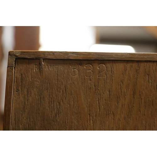 518 - Manner of Heals of London, a limed oak open bookcase, stamped to the reverse 'R Mawer', 91cm wide, 1... 