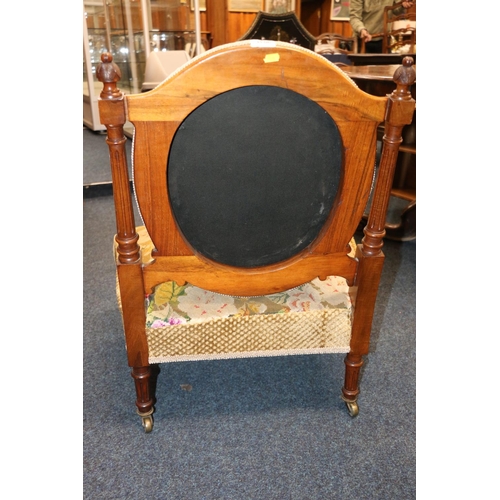 525 - Victorian walnut framed nursing chair, upholstered in green floral patterned needlework covering, ra... 