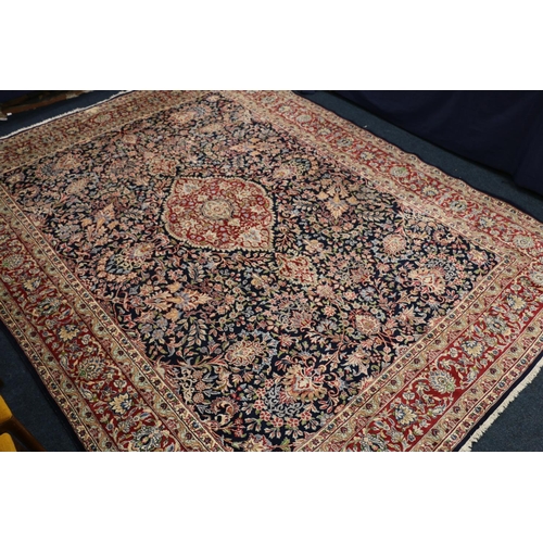 544 - Persian Khorasan style rug, the dark-coloured field with central leaf shaped panel surrounded by scr... 