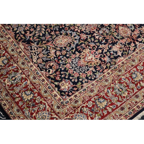 544 - Persian Khorasan style rug, the dark-coloured field with central leaf shaped panel surrounded by scr... 