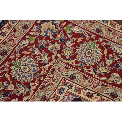 544 - Persian Khorasan style rug, the dark-coloured field with central leaf shaped panel surrounded by scr... 