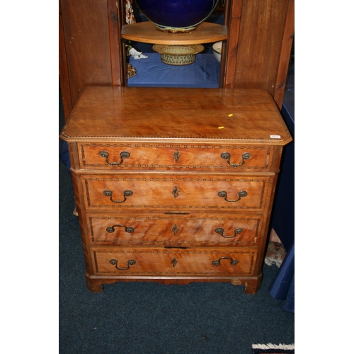 504 - Satinwood and chequered banded chest of drawers, the rectangular top with canted corners  and m... 