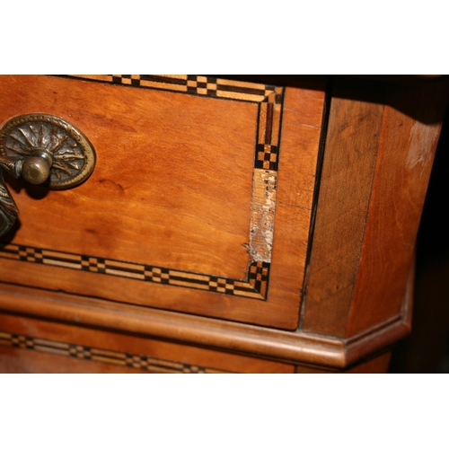 504 - Satinwood and chequered banded chest of drawers, the rectangular top with canted corners  and m... 