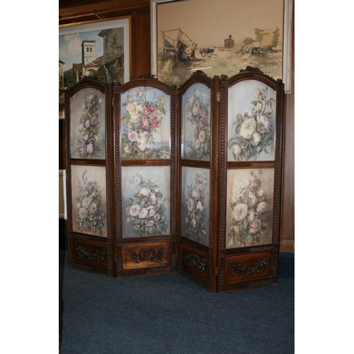 506 - Antique carved walnut four-fold dressing screen, the arch top with carved floral surmounts, each pan... 