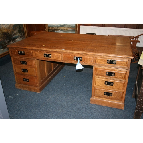 509 - 20th century oak partner's desk of typical form, 182cm wide, 121cm deep, 78cm tall.