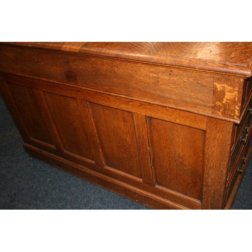 509 - 20th century oak partner's desk of typical form, 182cm wide, 121cm deep, 78cm tall.