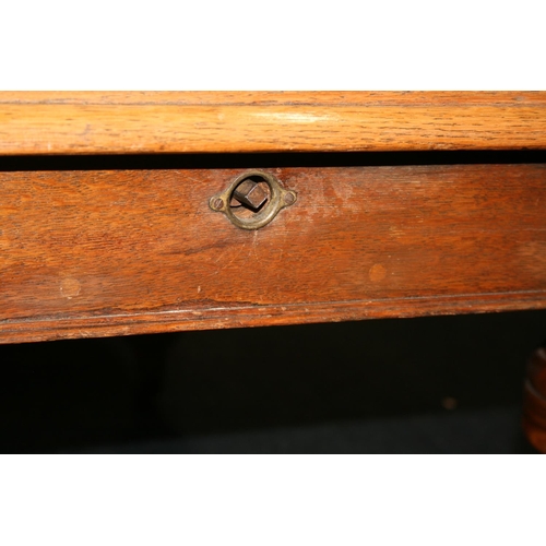 533 - Victorian oak telescopic dining table, the rectangular top with canted corners, raised on turned sup... 