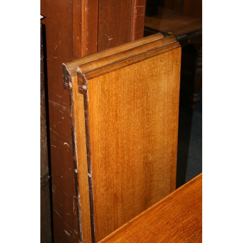 533 - Victorian oak telescopic dining table, the rectangular top with canted corners, raised on turned sup... 