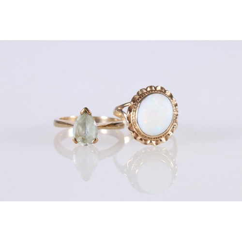 239 - 9ct gold dress ring set with large oval cabochon opal, maker L&W, size O, 3.8g, and 9ct gold dre... 