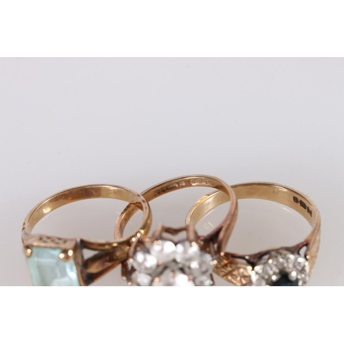 241 - 9ct gold nine stone paste set cluster ring, the stones in the form of a flowerhead, size L, 2.6g, 9c... 