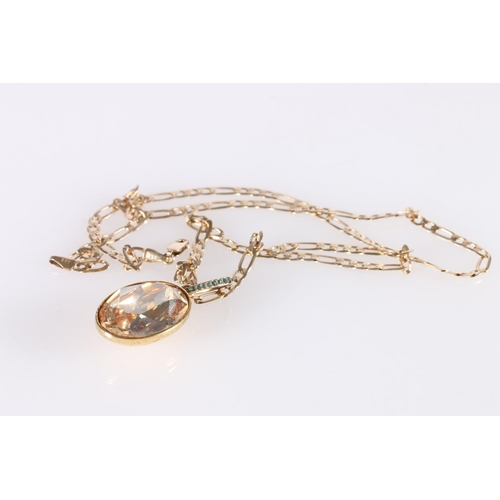 245 - Swarovski pendant on 9ct gold flattened curb link neck chain, the chain 8.5g. 