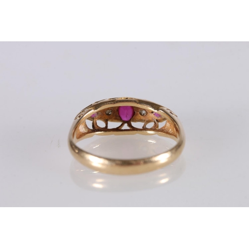 253 - 18ct gold ruby and diamond five-stone ring, the large faceted oval ruby flanked by diamonds and furt... 