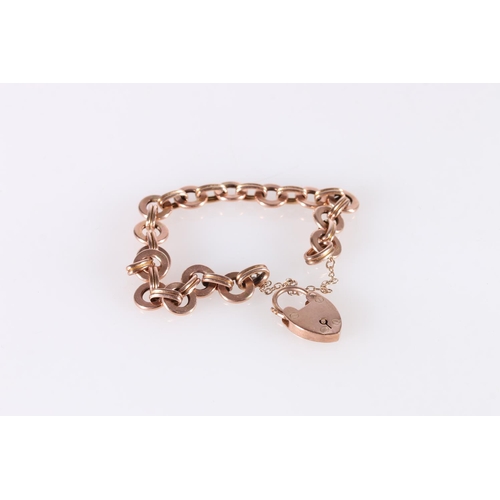 257 - 9ct rose gold bracelet of circular ring links with padlock closure, 15.4g.