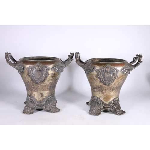 362 - Pair of silver plated wine coolers of baluster form with twin acanthus scroll handles, raised on sca... 