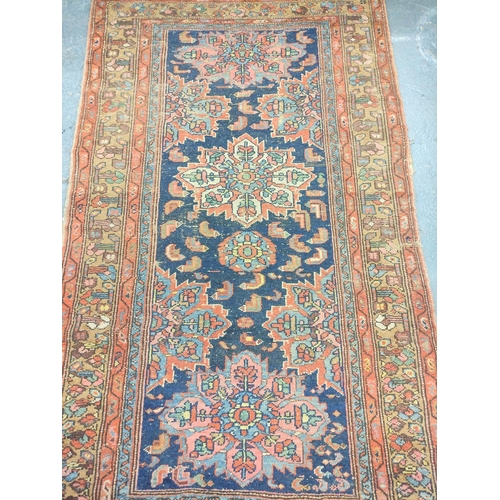 222 - Antique Kurdistan / Turkish hand knotted rug with geometric medallions to the centre with further mo... 