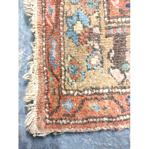 222 - Antique Kurdistan / Turkish hand knotted rug with geometric medallions to the centre with further mo... 