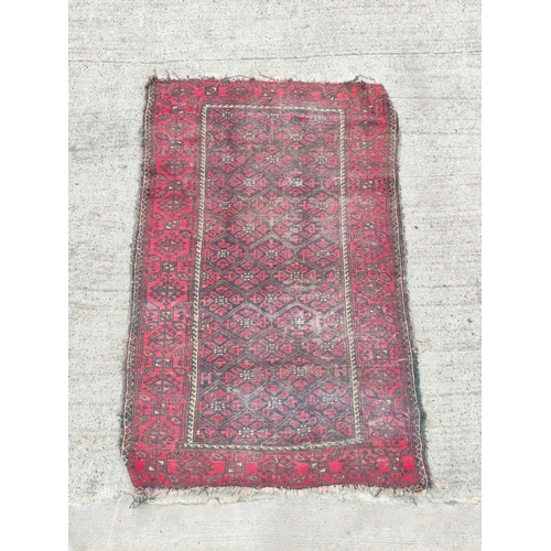 224 - Turkish Belouch hand knotted rug with allover geometric motifs to the centre with further geometric ... 