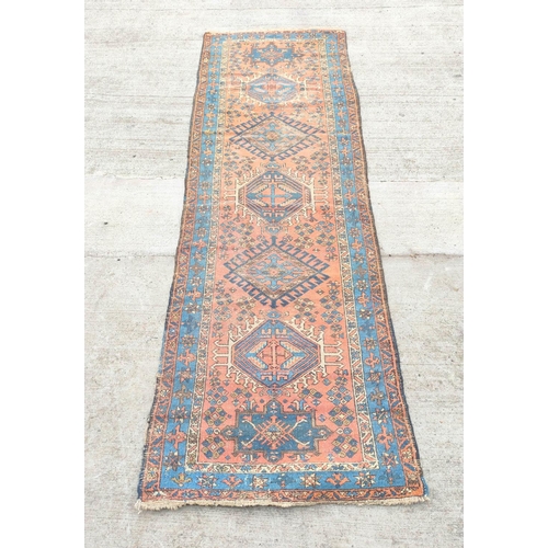 226 - Antique Kurdistan / Turkish hand knotted runner with assorted geometric medallions to the centre wit... 