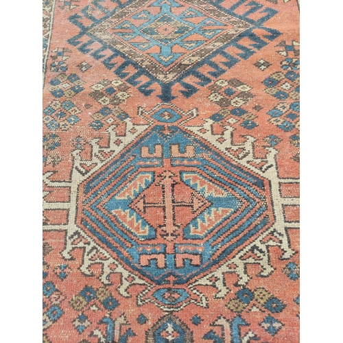 226 - Antique Kurdistan / Turkish hand knotted runner with assorted geometric medallions to the centre wit... 