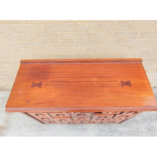 399 - Vintage haberdashery chest of drawers, retailed by Ray Miles of Liverpool, with four sets of five gr... 