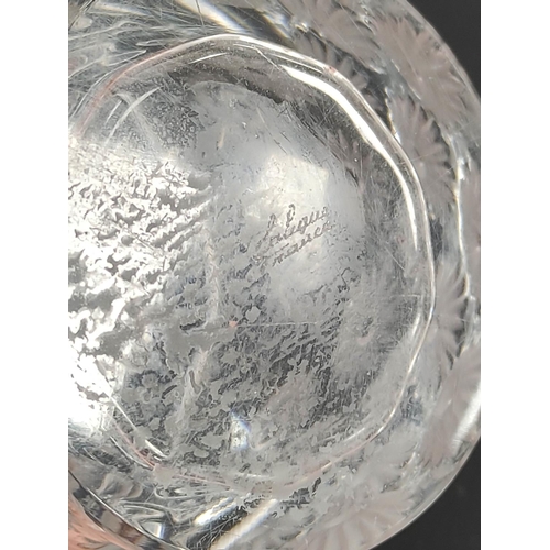 188 - Lalique Daisy pattern frosted glass tumbler, Signed to the underside, 7cm high. 