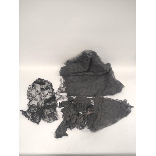 194 - Small quantity of black lace including a shawl and various items of passementerie.