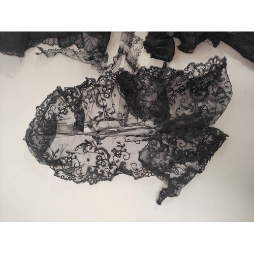 194 - Small quantity of black lace including a shawl and various items of passementerie.