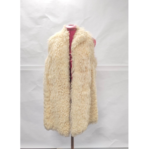 196 - Vintage cream angora mohair goatskin long waistcoat or gillet; also a vintage Alexon black faux fur ... 