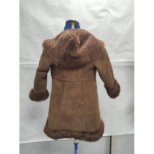 205 - Vintage banded brown sheepskin and leather coat, no labels, approx. size 8/10?; also a child's sheep... 