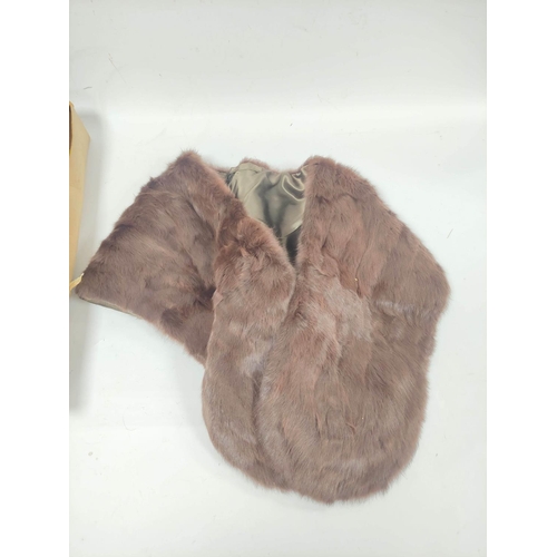 208 - Vintage brown mink fur stole; a narrow white fur stole and a 20th century Eastern headdress, probabl... 