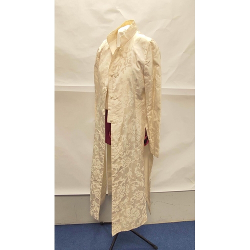 211 - Modern Chinese cream silk trouser suit comprising long floral brocade jacket with raw silk trousers.