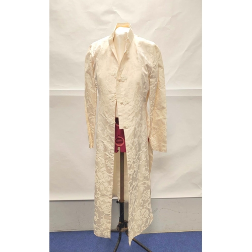 211 - Modern Chinese cream silk trouser suit comprising long floral brocade jacket with raw silk trousers.