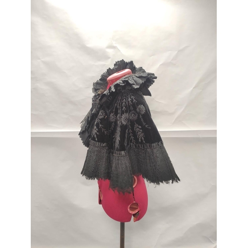 212 - Victorian or Edwardian lady's black velvet evening cape with beaded and embroidered floral decoratio... 