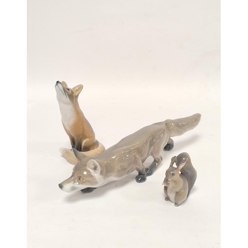 326 - Royal Copenhagen fox figure, modelled as an upright fox, shape and model numbers 946, 1475 with a Bi... 