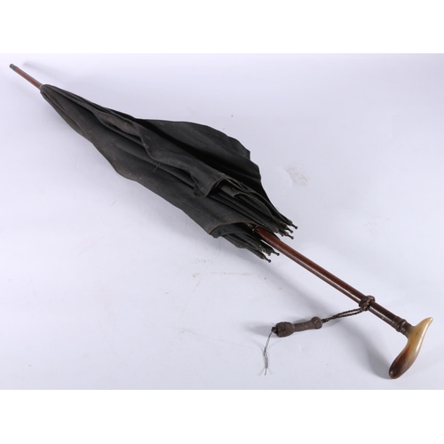 350 - Antique parasol or umbrella, the horn handle possibly Rhino horn, 77.5cm long. 