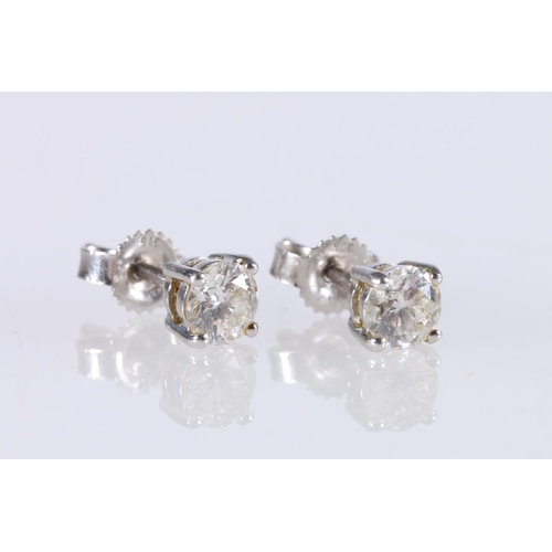 249A - Pair of 9ct white gold diamond solitaire ear studs, the diamonds approximately 0.3ct stones each, 0.... 