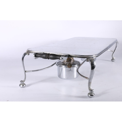 364 - Harrods of London, a white metal plate warmer stand with two burners to the underside, raised o... 