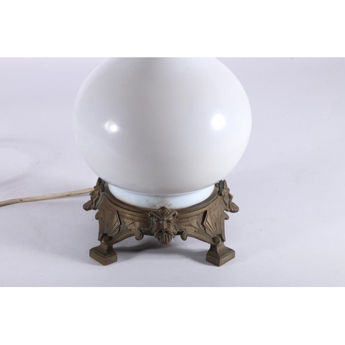 408 - Antique baluster shaped milk glass table lamp with metal mounts, 48cm tall. 