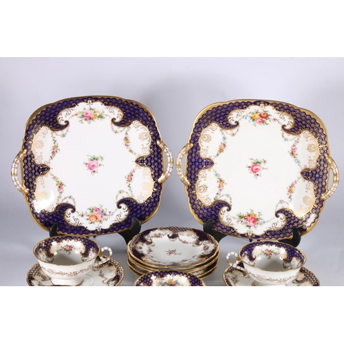 446 - Coalport English porcelain cobalt blue gilt and hand-painted floral 6711 pattern nineteen piece tea ... 