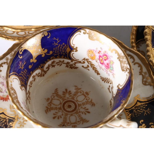 448 - Harlequin set of Coalport English porcelain cobalt blue gilt and hand-painted floral batwing pattern... 