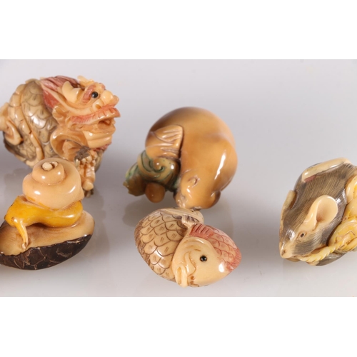 489 - Ten coloured resin netsuke including snake, dragon, walrus, rat, tortoise, etc.