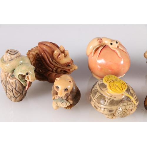 489 - Ten coloured resin netsuke including snake, dragon, walrus, rat, tortoise, etc.