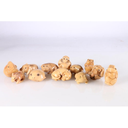 490 - Twelve resin netsuke including fish, monkey, elephant, frog, horse etc.