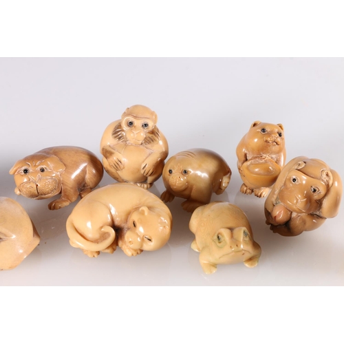 490 - Twelve resin netsuke including fish, monkey, elephant, frog, horse etc.