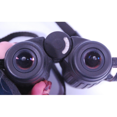 318 - Pair of Leica 10x42 BA binoculars, 13.5cm high.