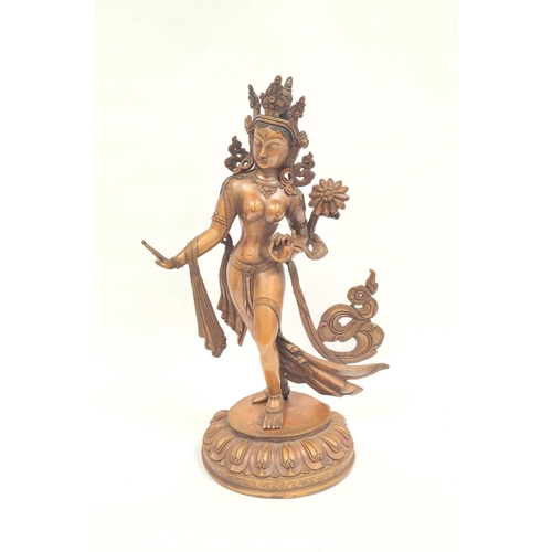 360 - Sino-Tibetan patinated bronze figure of a female deity standing on oval lotus plinth base, 39cm high... 