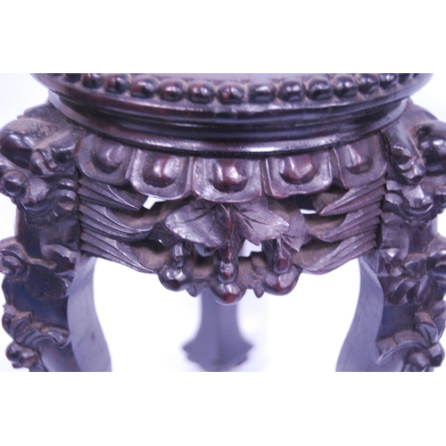 243 - Chinese padouk jardinière stand with marble inset, fruit and vine frieze, on ball and claw feet, 31.... 