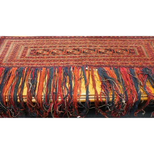 548 - Turkestan tekke torba or Kapanuk wall hanging with fringed decoration, 133cm x 80cm.