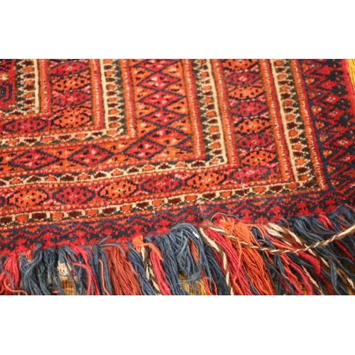 548 - Turkestan tekke torba or Kapanuk wall hanging with fringed decoration, 133cm x 80cm.